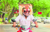 Student&rsquo;s helmet apes &rsquo;Hulivesha&rsquo; in city